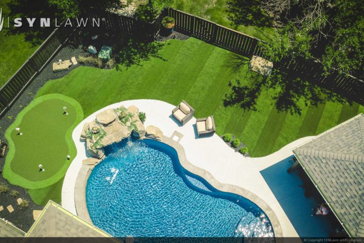 residential grass lawn poolside