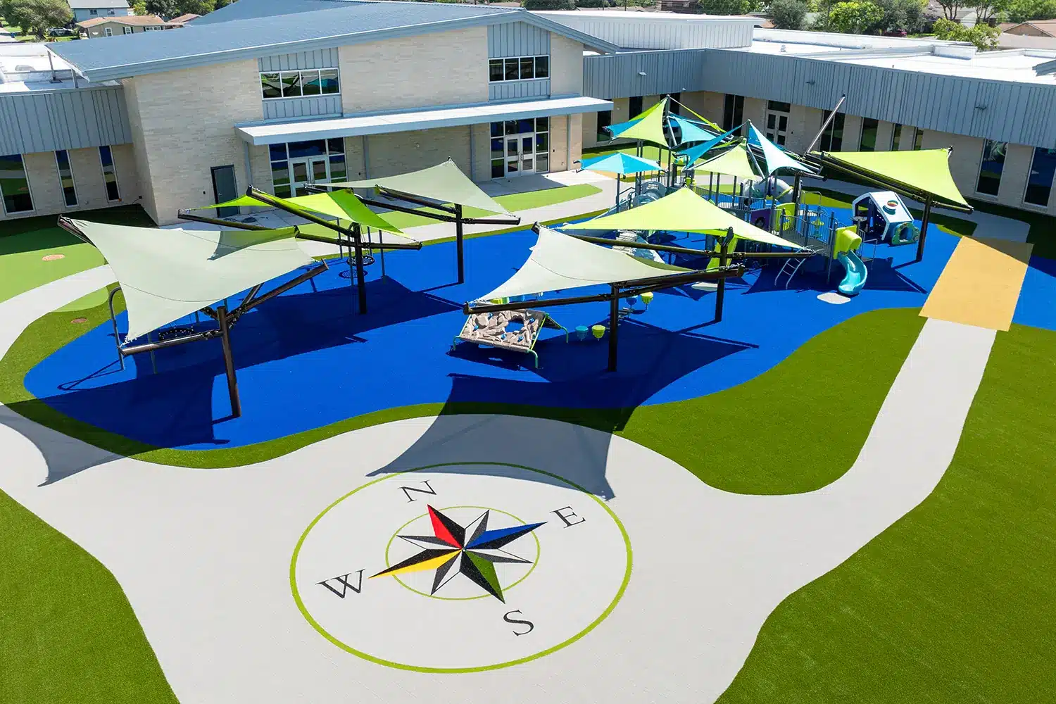 Drone shot of commercial artificial playground grass from SYNLawn