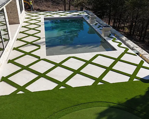 Artificial grass pool deck installed by SYNLawn